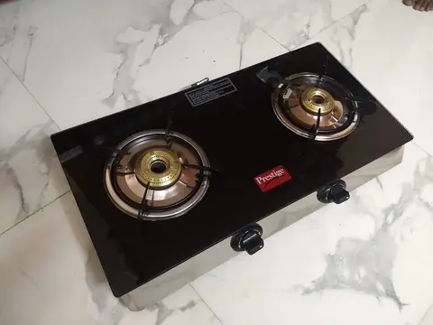 Cuisinière 4 feux Whirlpool four électrique